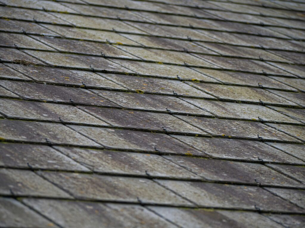 a close up of a roof made of wood planks