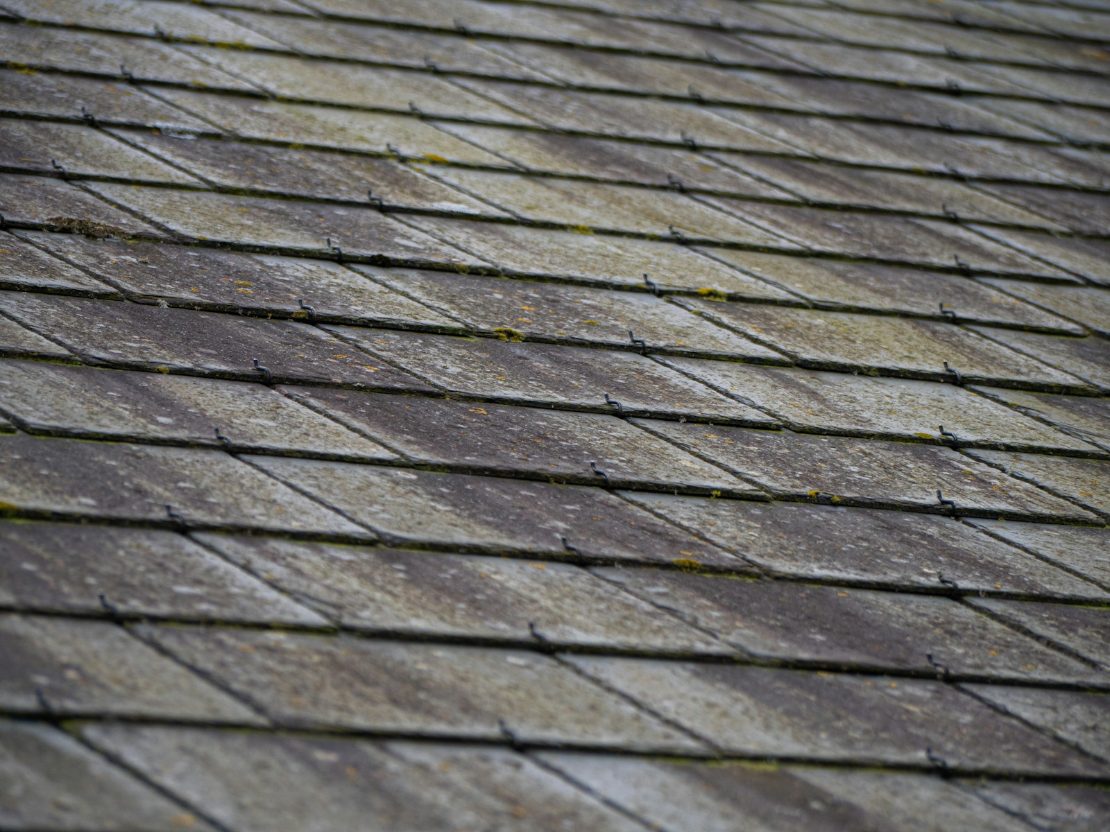 a close up of a roof made of wood planks